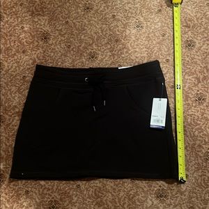 Gaian black micro fleece skirt with front pockets